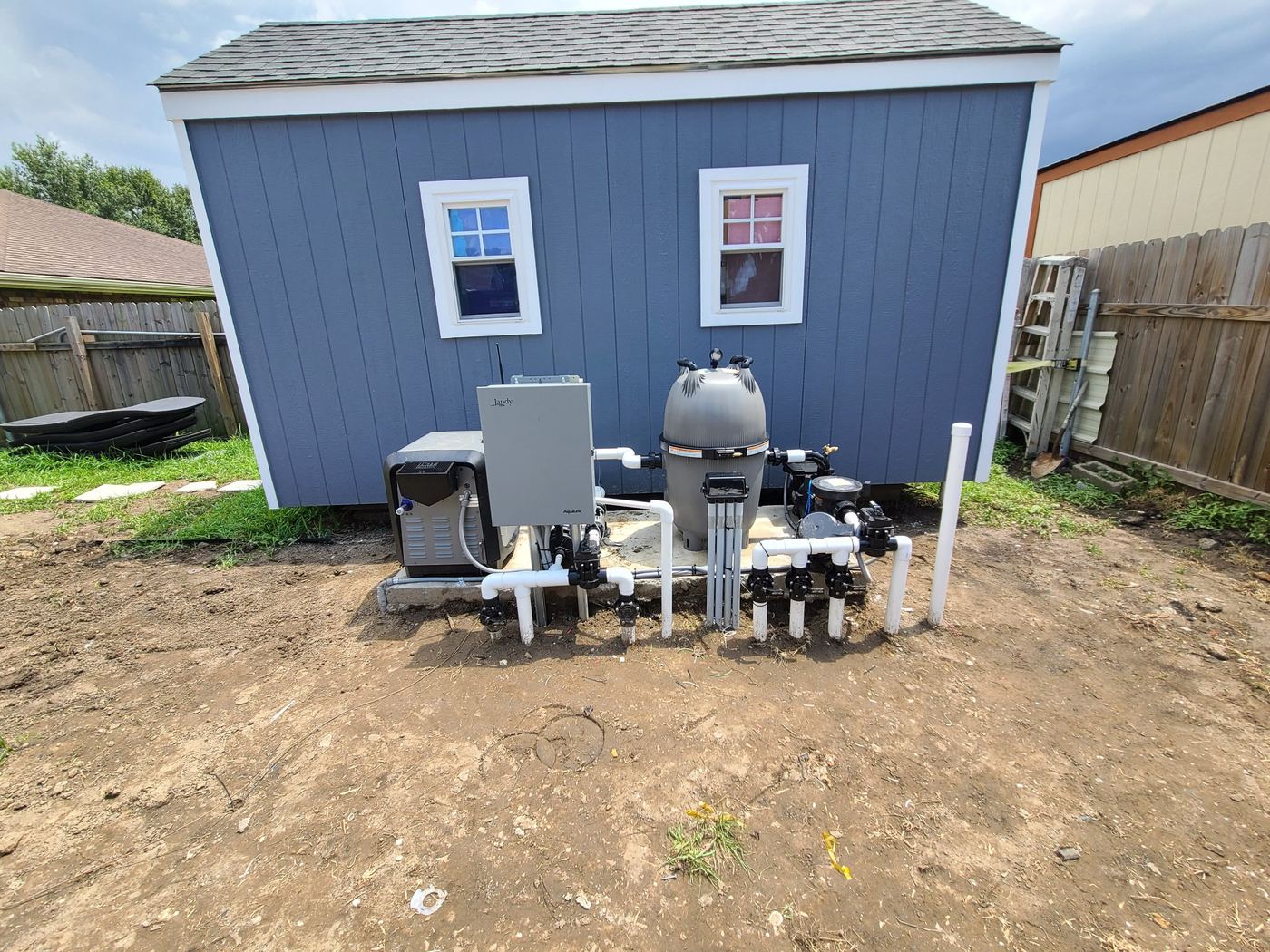 Step 10 of 14, Equipment: The equipment pad: heater, filter, pump, valves, and controls.